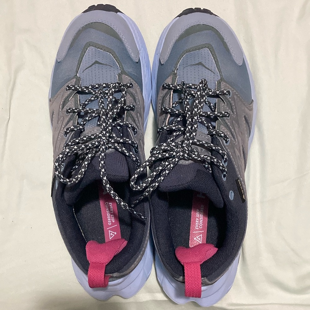 Hoka Gray and Pink Athletic Shoes with Modern Design